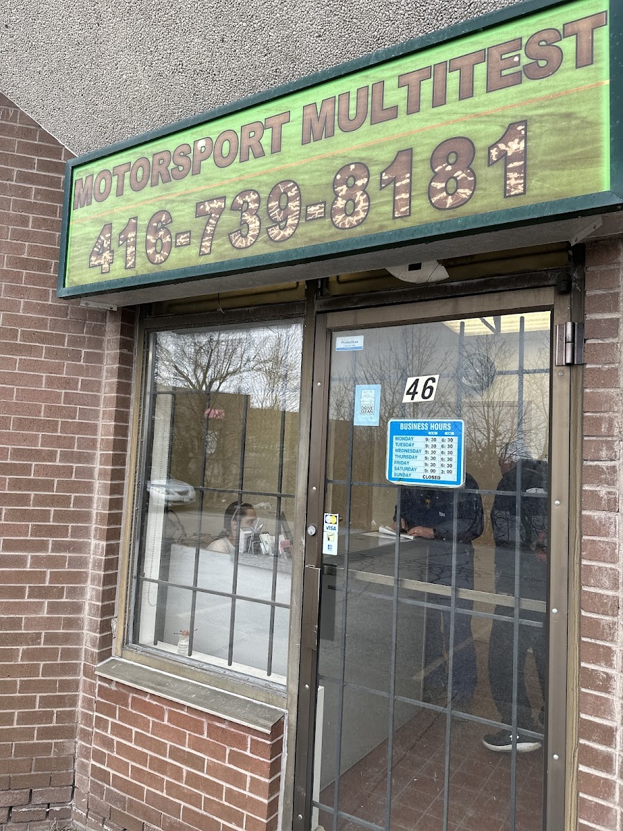 Motorsport Multitest storefront sign on Dufferin Street